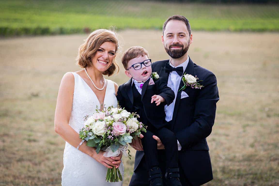 Michelle and Mark's wedding photo with Patrick