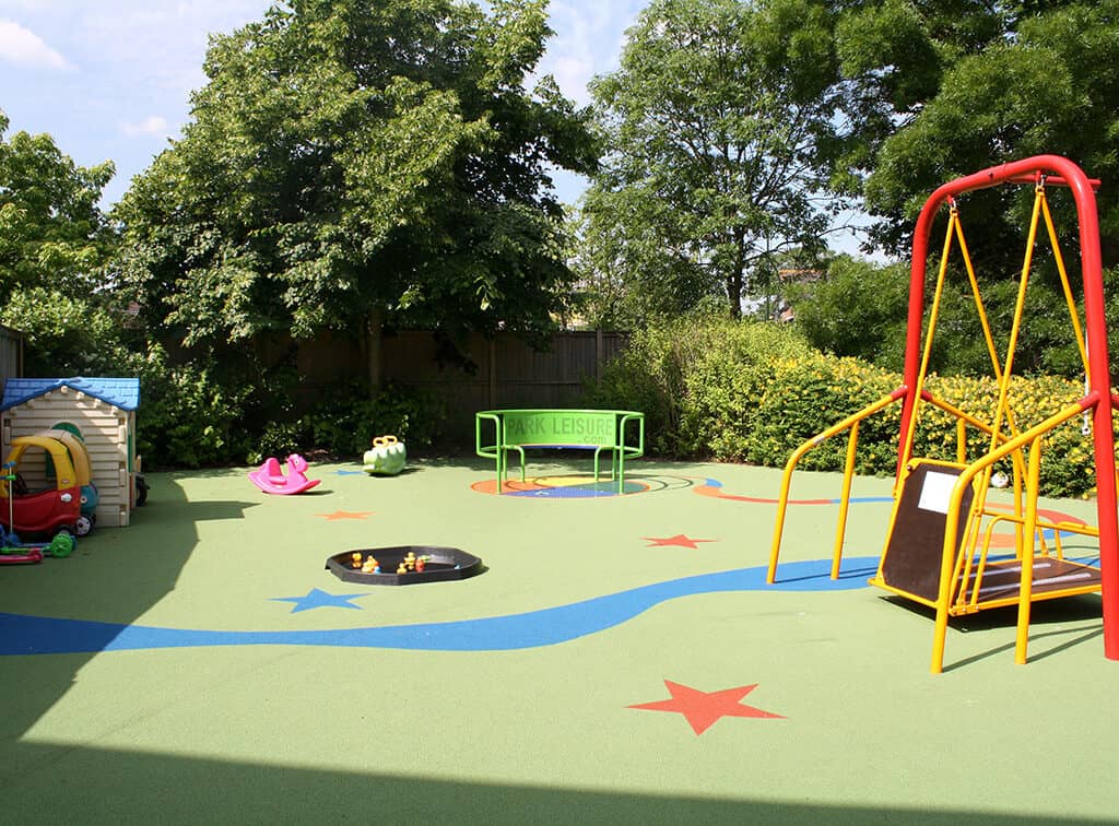 Fun accessible play area with games and swings.