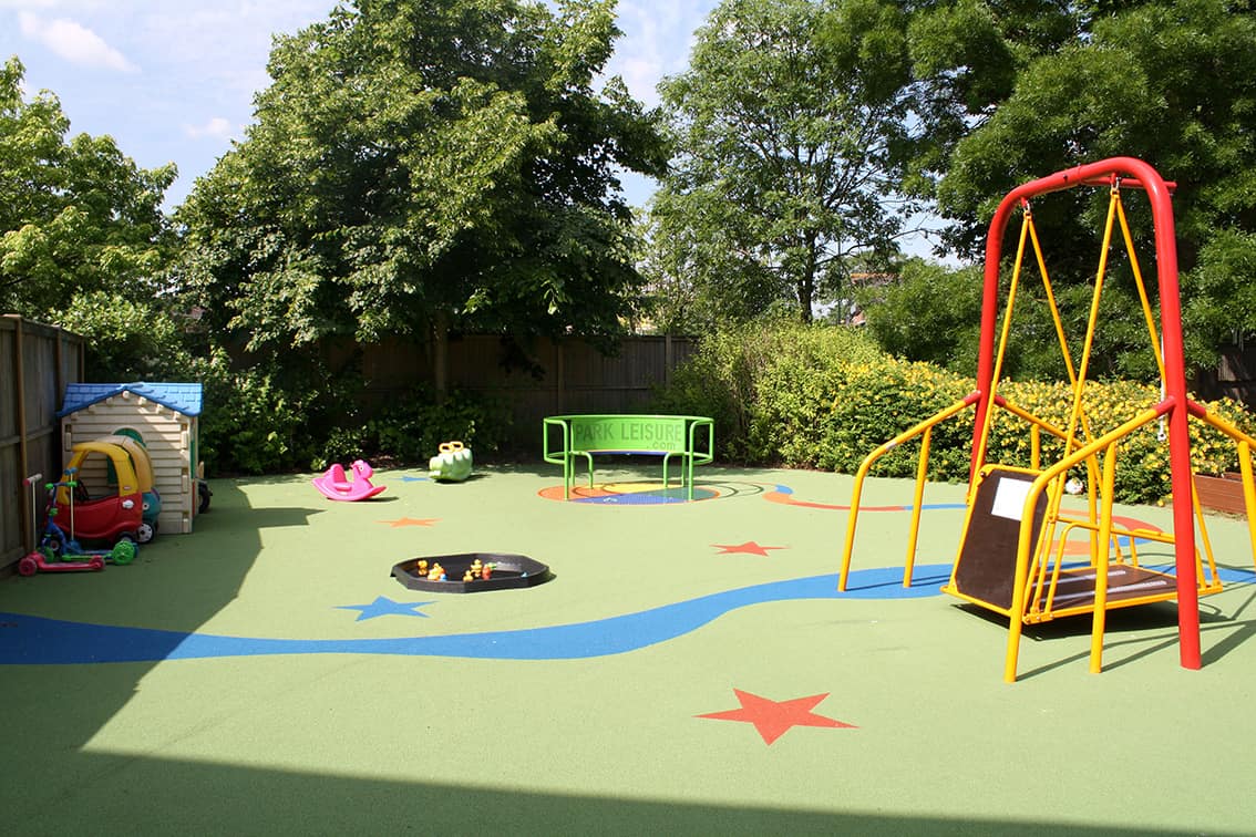 Fun accessible play area with games and swings.