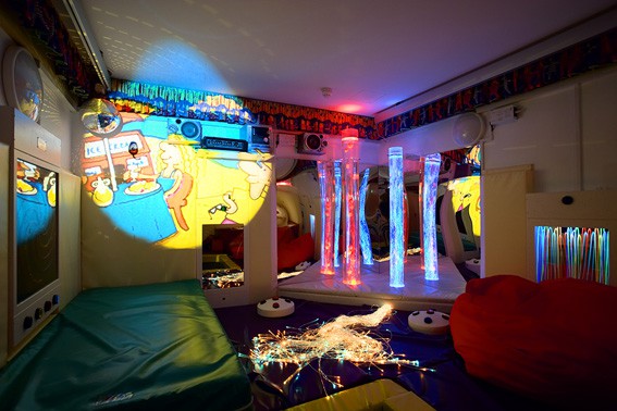 Incredible sensory room with panels of lightings, LED lights and other equipment for the children to use.