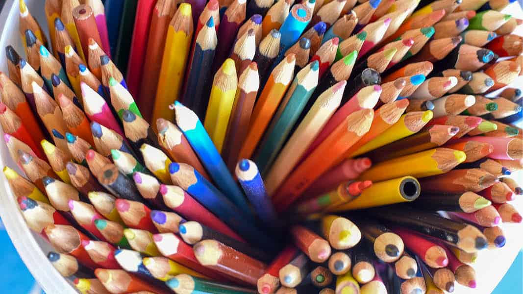 Arty image of a pot of colouring pencils