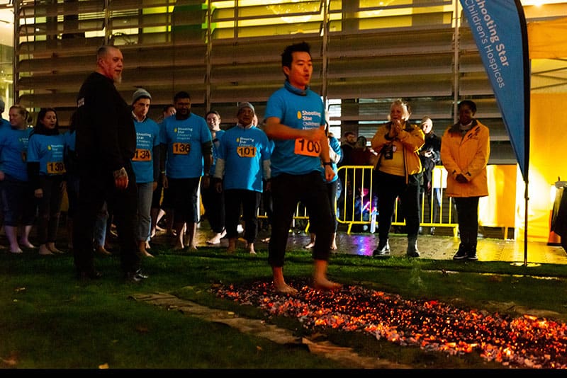 Many brave ‘soles’ succeeded at the spectacular Fire Walk in Chiswick