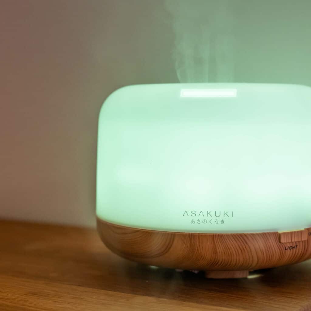 Aromatherapy light/steam device with vapour coming out.