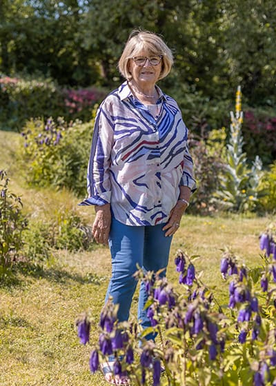 Di standing in the garden at Christopher's