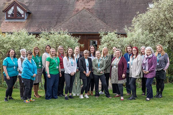 Our family support team posing for a photo in the hospice garden